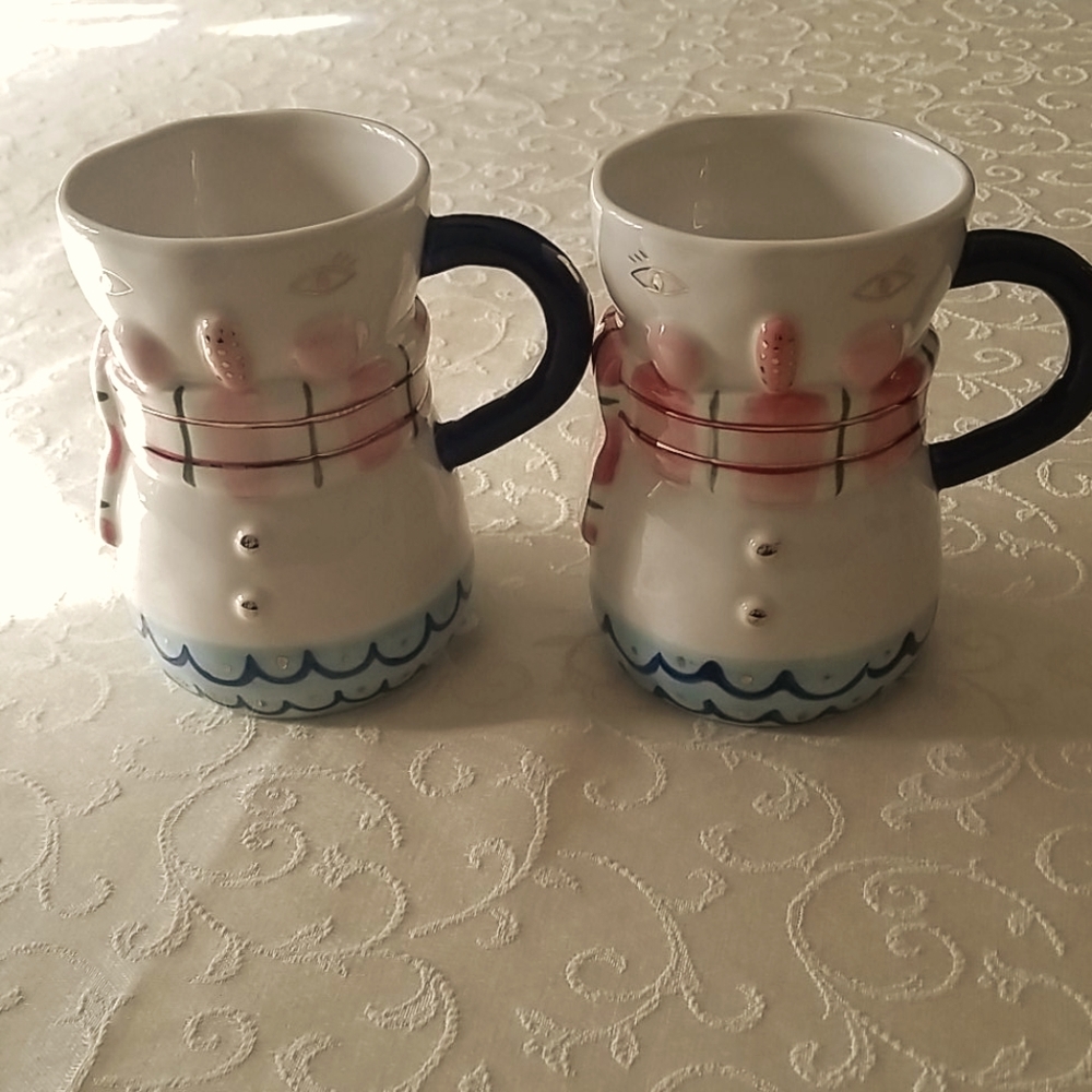 Brand new. Anthropologie Snowman Mugs.